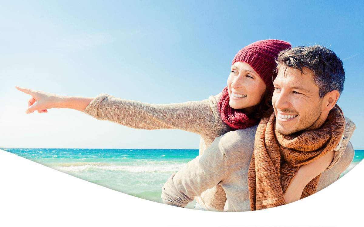 Danbar for Life banner picture showcasing healthy couple on the beach